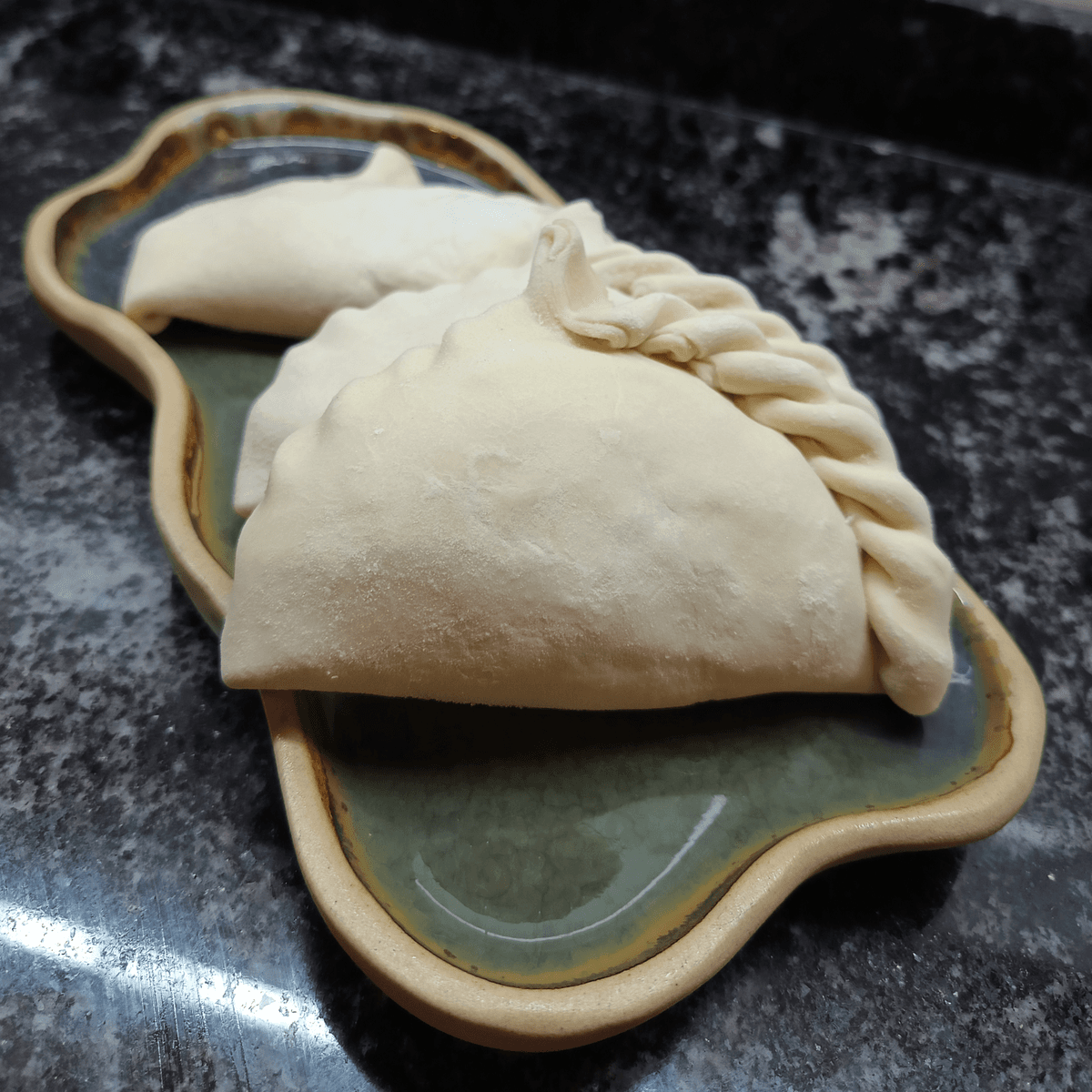 Pork shoulder empanada