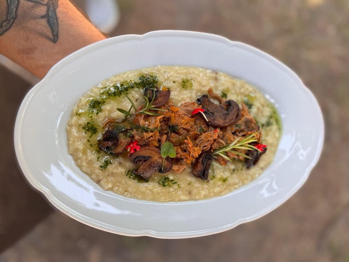 Risotto Parmesano con ragú de cabrito