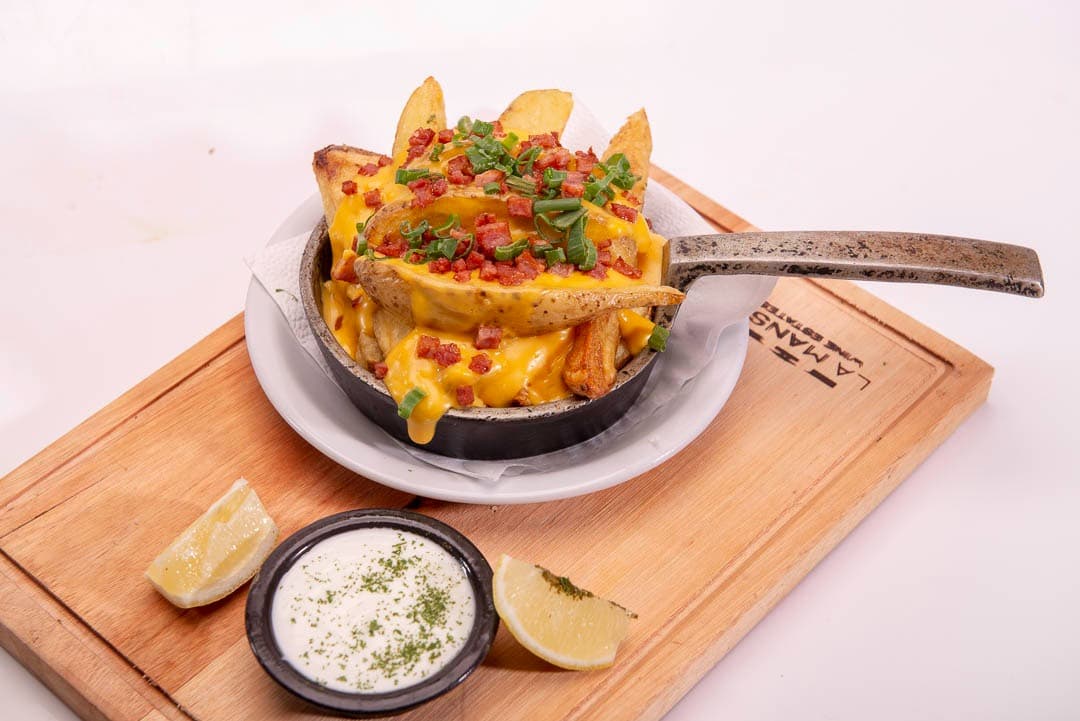 papas rusticas patanegra (panceta, cheddar y verdeo)